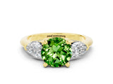 Yellow gold Three-Stone Round Cut Peridot Ring with Pear Side Stones and Four-Prong Setting