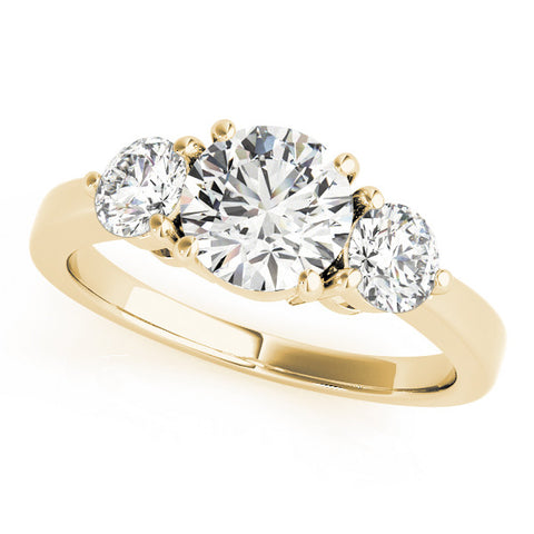 Yellow gold Three-Stone Round Cut Solitaire Ring with Prong Setting on a Classic Band