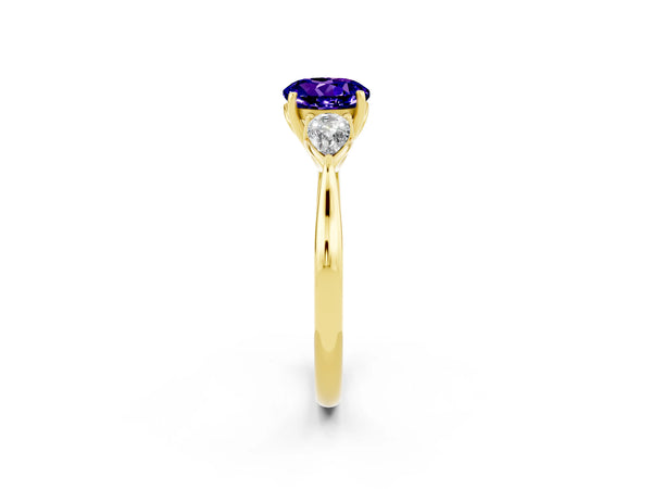 Yellow gold Three-Stone Round Cut Tanzanite Ring with Pear  Side Stones in Four-Prong Setting