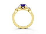 Yellow gold Three-Stone Round Cut Tanzanite Ring with Pear  Side Stones in Four-Prong Setting_39
