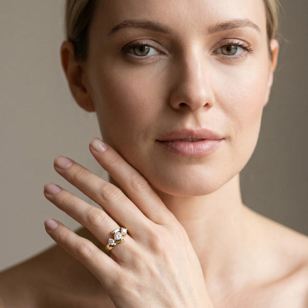 Yellow gold Three-Stone Round Cut Tension Band Ring with Four-Prong Setting