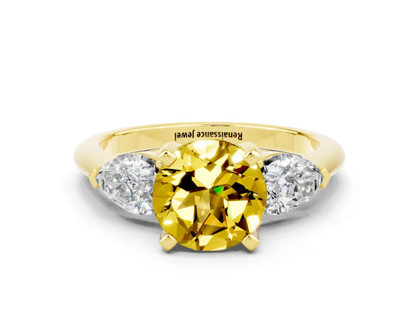 Yellow gold Three-Stone Round Cut Yellow Sapphire Ring with Pear Side Stones and Four-Prong Setting