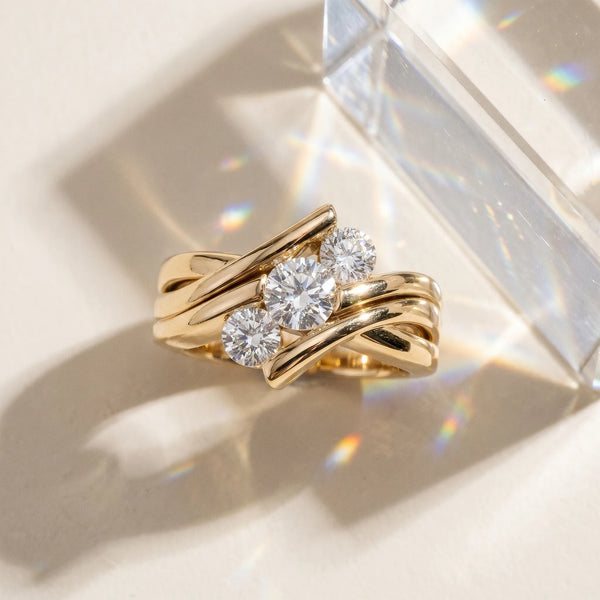 Yellow gold Three-Stone Round Diamond Crossover Band with Channel Prong Setting