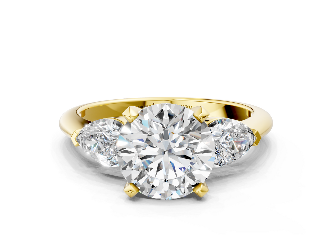 Yellow gold Three-Stone Round Diamond Ring with Pear Side Stones in Four-Prong Setting_63