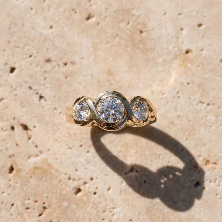 Yellow gold Three-Stone Round Diamond Wave Band with Bezel Setting