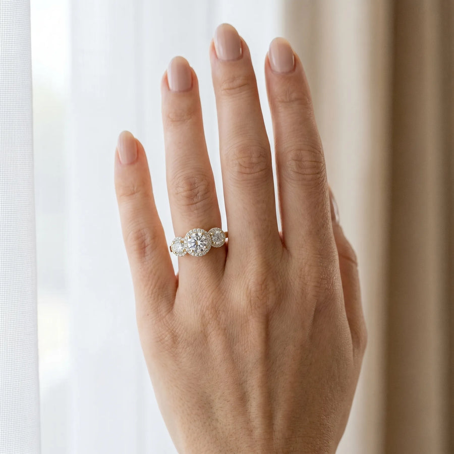 Yellow gold Three-Stone Round Halo Diamond Ring with Pavé Band and Prong Setting