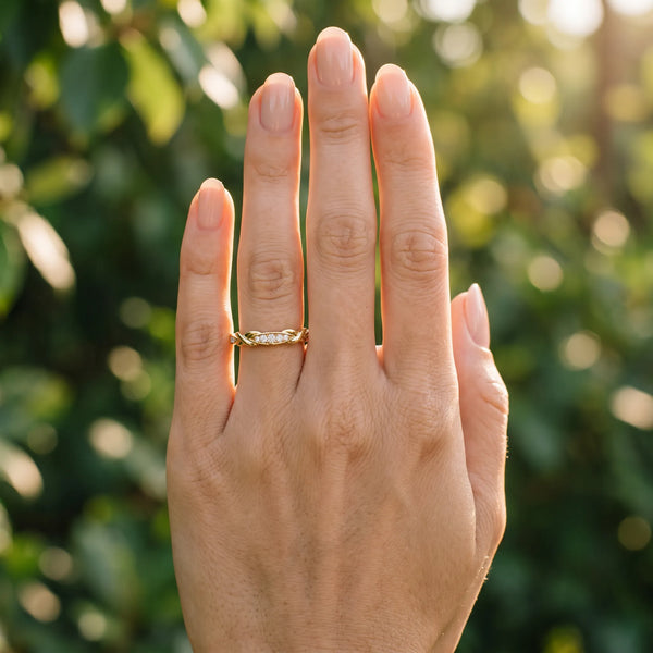Yellow gold Twisted Marquise Diamond Pavé Band with Shared Prong Setting