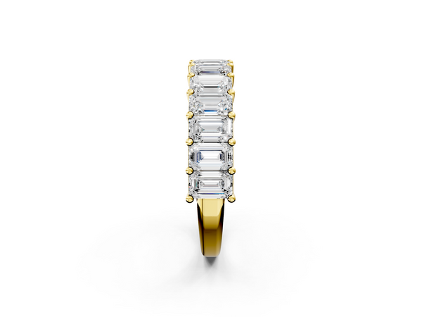 Yellow gold emerald cut diamond half eternity band with shared prong setting