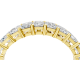 Yellow gold emerald cut diamond half eternity band with shared prong setting_21