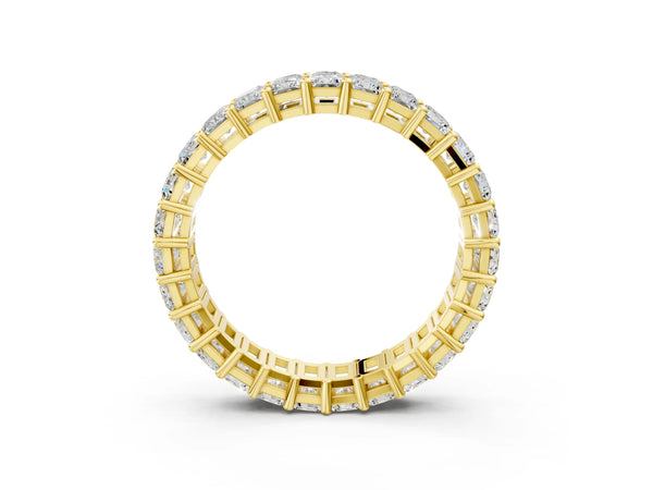 Yellow gold radiant cut diamond eternity band with shared prong setting