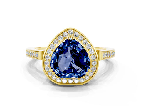 Yellow gold {shape_name} Blue Sapphire Halo Ring with Split Shank and Four-Prong Setting