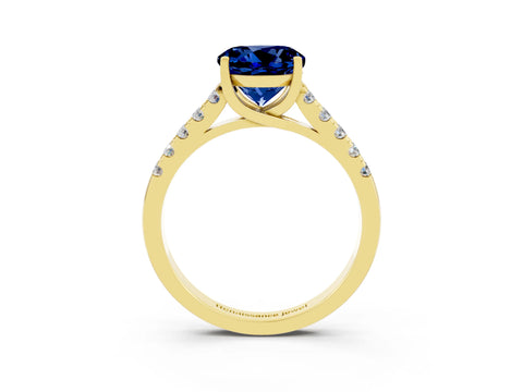 Yellow gold {shape_name} Blue Sapphire Solitaire Ring with Pavé Band and Four-Prong Setting_3