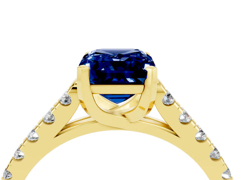 Yellow gold {shape_name} Blue Sapphire Solitaire Ring with Pavé Band and Four-Prong Setting_4