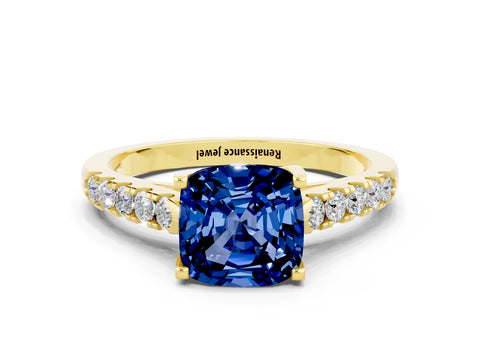 Yellow gold {shape_name} Blue Sapphire Solitaire Ring with Pavé Band and Four-Prong Setting