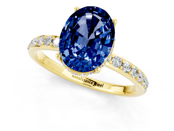 Yellow gold Oval Cut Blue Sapphire Solitaire Ring with Pavé Band and Hidden Halo