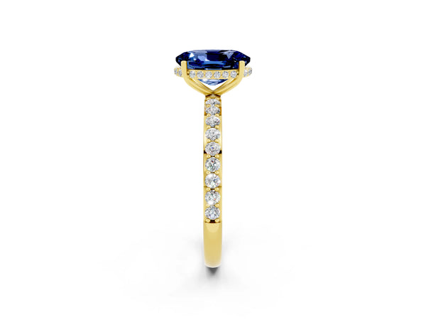 Yellow gold Oval Cut Blue Sapphire Solitaire Ring with Pavé Band and Hidden Halo