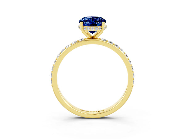 Yellow gold Oval Cut Blue Sapphire Solitaire Ring with Pavé Band and Hidden Halo