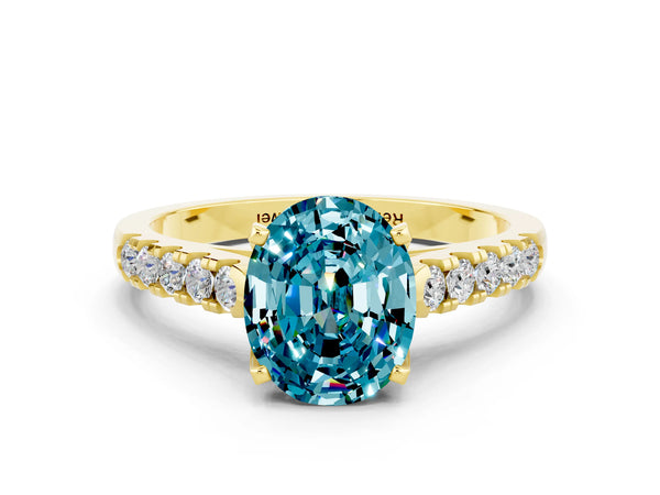 Yellow gold Oval Cut Blue Topaz Pavé Band Solitaire Ring with Prong Setting