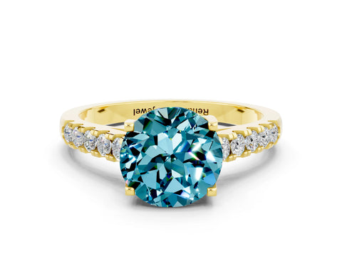 Yellow gold {shape_name} Blue Topaz Solitaire Ring with Pavé Band and Four-Prong Setting