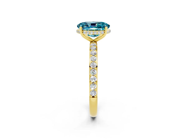 Yellow gold Oval Cut Blue Topaz Solitaire Ring with Pavé Band and Hidden Halo