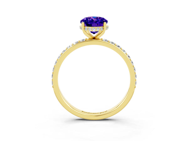 Yellow gold Oval Cut Tanzanite Solitaire Ring with Pavé Band and Hidden Halo