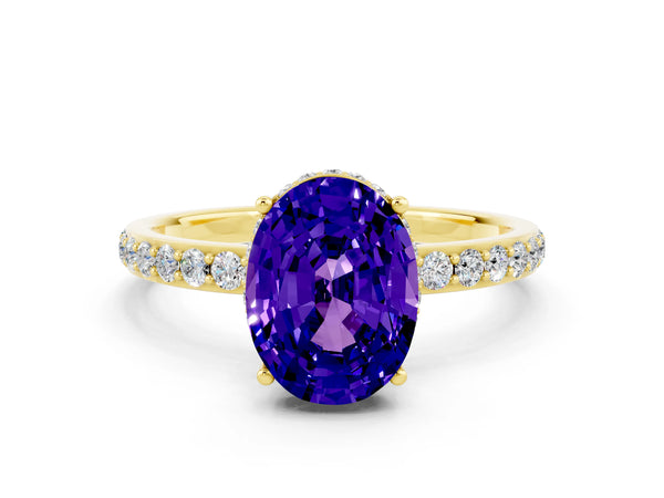 Yellow gold Oval Cut Tanzanite Solitaire Ring with Pavé Band and Hidden Halo