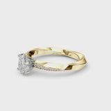Yellow gold Oval Cut Diamond Engagement Ring with Side Stone Accents and Four-Prong Setting