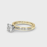 Yellow gold Round Solitaire Diamond Ring with Channel-Set Baguette Band and Four-Prong Setting