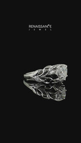 Silver Heart Cut Diamond Leaf-Inspired Engagement Ring with Round Accents and Prong Setting
