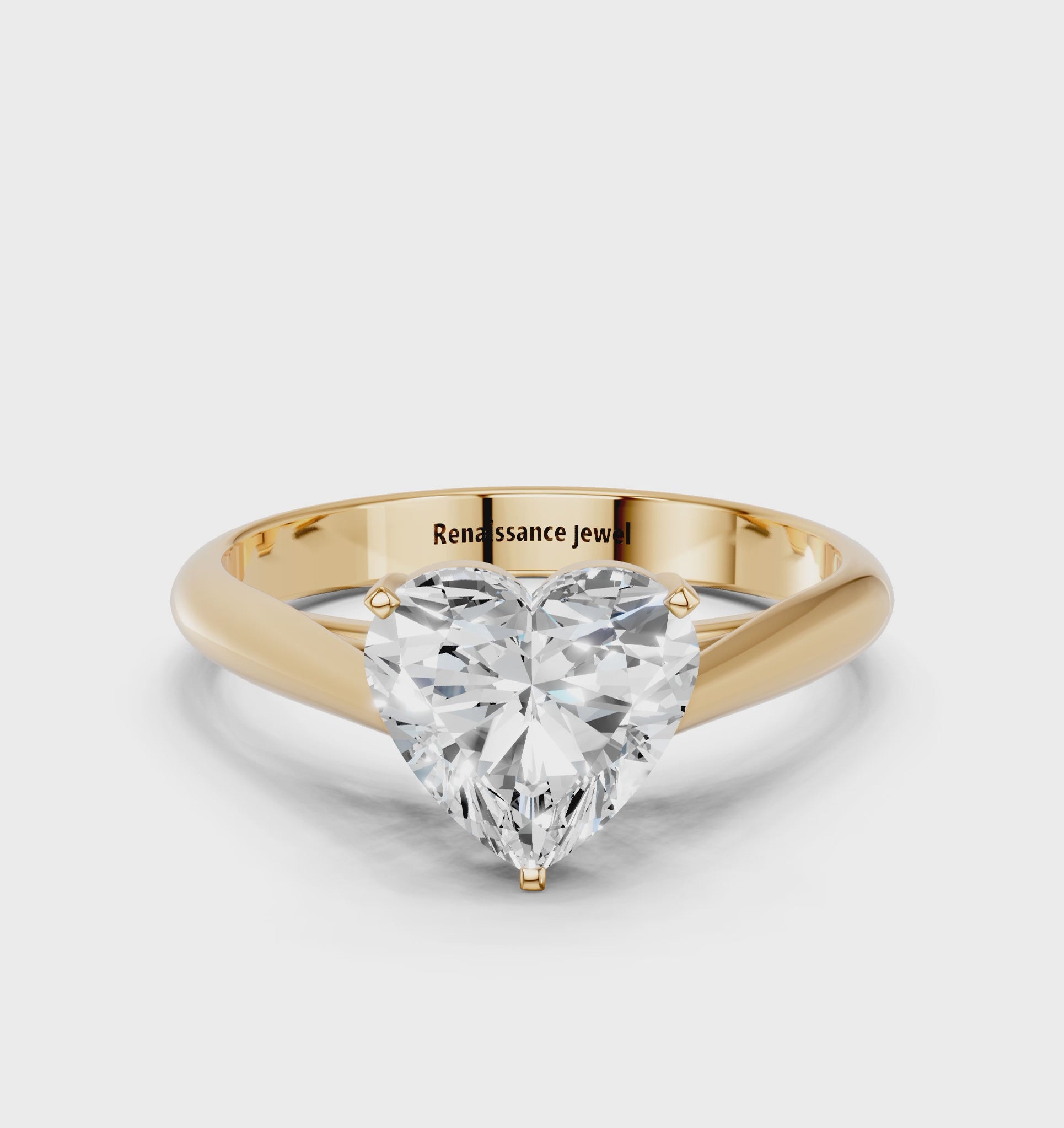 Yellow gold Heart Solitaire Diamond Engagement Ring with Cathedral Setting and Four-Prong Mount on a Classic Band_130