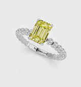 White gold Fancy Yellow Emerald Cut Diamond Solitaire Ring with Beaded Band and Prong Setting