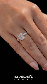Platinum Emerald Cut Diamond Ring with Marquise and Round  Side Stones and Four-Prong Setting