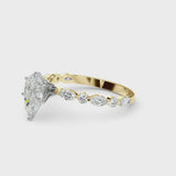 Yellow gold Pear Cut Diamond Ring with Marquise Side Stones and Prong Setting