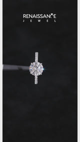 White gold Marquise Cut Diamond Brilliant Solitaire Ring with Pavé Band and Four-Prong Setting
