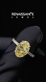 Yellow gold Fancy Yellow Oval Cut Diamond Solitaire Ring with Round  Pavé Band and Prong Setting