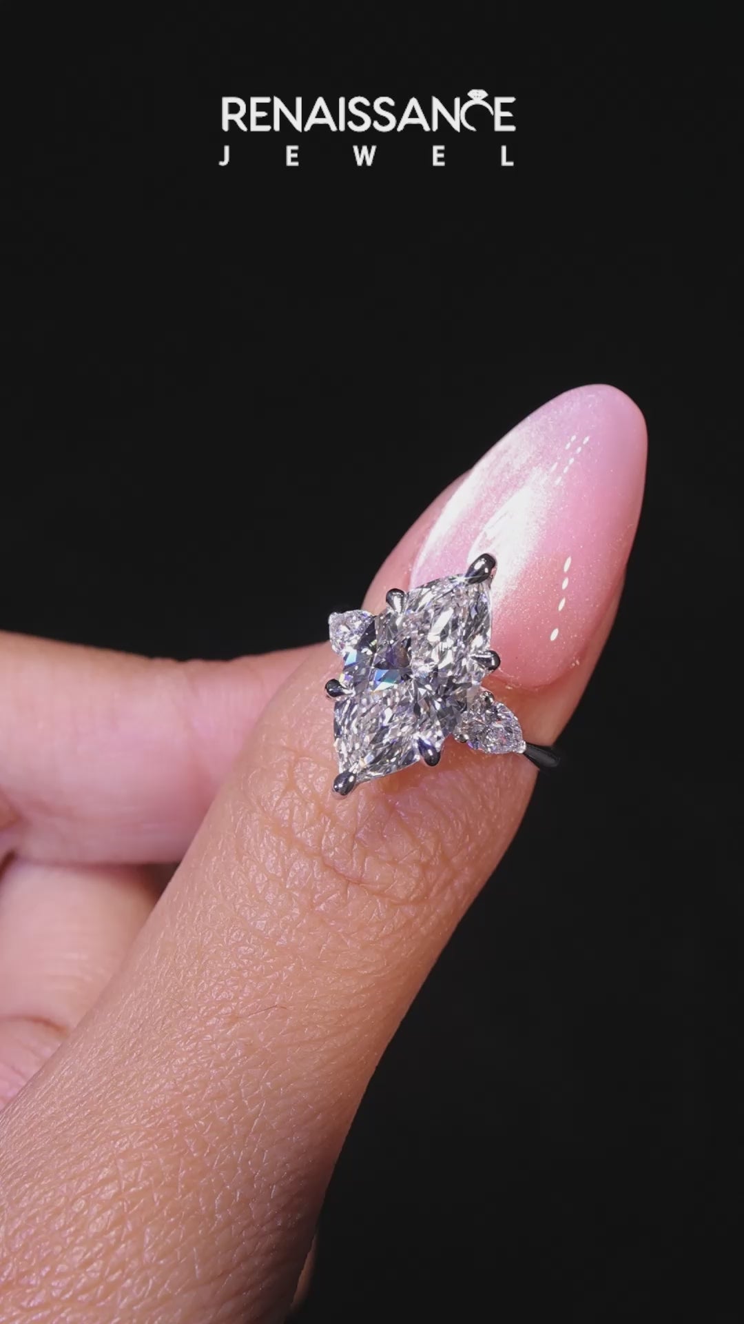 Platinum Three-Stone Marquise Diamond Ring with Pear Side Stones in Four-Prong Setting_24