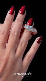 Yellow gold Radiant Cut Diamond Three-Stone Ring with Channel Set Band and Four-Prong Setting