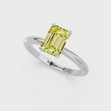 Silver Fancy Yellow Emerald Cut Diamond Solitaire Ring with Six-Prong Setting and Classic Band