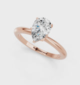 Rose gold Pear Cut Diamond Solitaire Ring with Six-Prong Setting and Classic Band