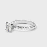 Platinum Round Solitaire Bezel Accent Diamond Engagement Ring with Beaded Band and Four-Prong Setting