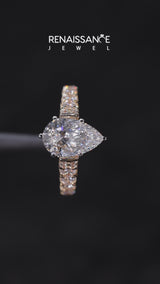 Rose gold Pear Cut Diamond Side Stone Solitaire Ring with Round  and Four-Prong Setting