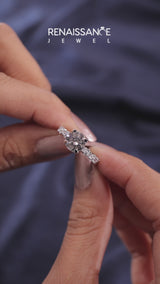 Silver Round Cut Diamond Side Stone Solitaire Ring with Round  and Four-Prong Setting