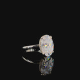 Rose gold Oval Solitaire Engagement Ring with Cathedral Band and Four-Prong Setting