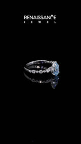 Platinum Fancy Blue Pear Cut Diamond Prong Set Engagement Ring with Pavé Band
