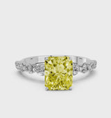 White gold Fancy Yellow Radiant Cut Solitaire Diamond Ring with Pave Band and Four-Prong Setting