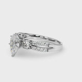 Platinum Pear Cut Diamond Three-Stone Ring with Pavé Split Shank and Four-Prong Setting