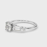 White gold Round Cut Diamond Ring with Baguette Side Stones, Channel Set Band, and Four-Prong Setting