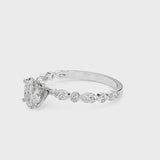 14K White Gold 1.08 Carat F VVS1 Oval Solitaire with Side Stones on a Pavé Band and Four-Prong Setting