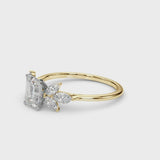 Yellow gold Radiant Diamond Floral Cluster Ring with Marquise Side Stones and Six-Prong Solitaire Setting