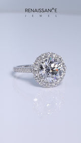 White gold Emerald Cut Diamond Floral Halo Ring with Pavé Band and Prong Setting